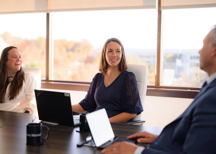 team members in conference room